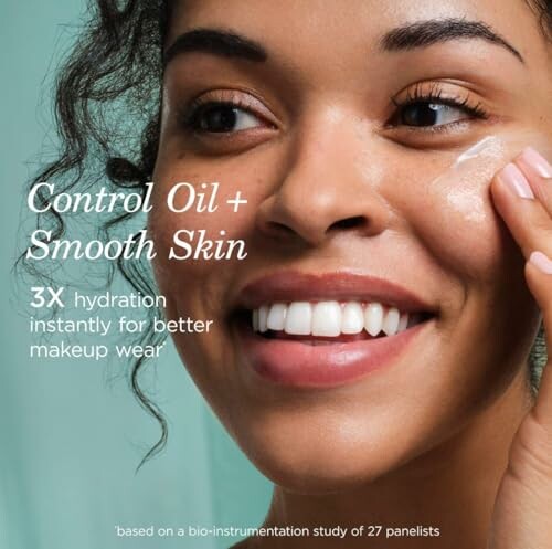 Smiling woman applying skincare product to her face.