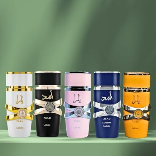 Collection of five colorful Arabian perfume bottles on a green background.