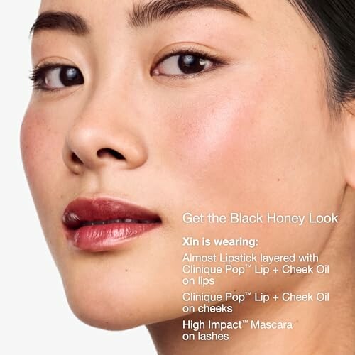 Close-up of a person wearing makeup with text describing the Black Honey Look.