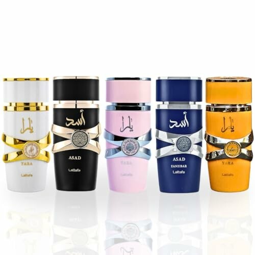 Five luxury perfume bottles in various colors and designs.
