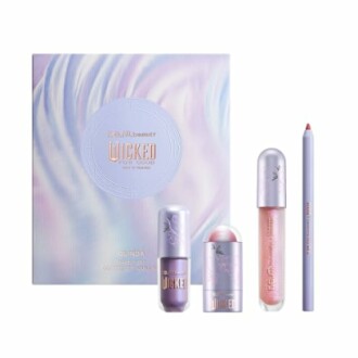 Pastel-themed makeup set with lipstick, lip gloss, and pencil.