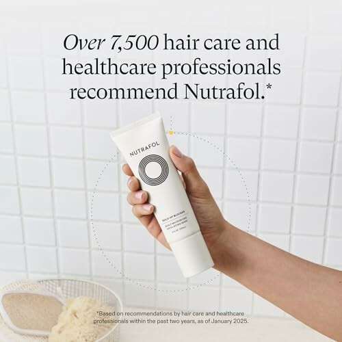 Hand holding Nutrafol product against tiled background with recommendation text.