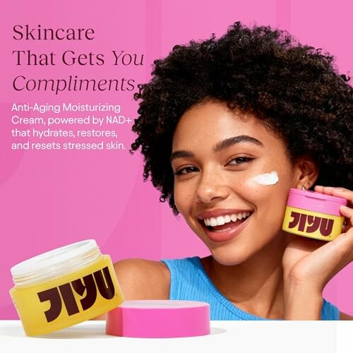 Woman applying anti-aging cream with product container.