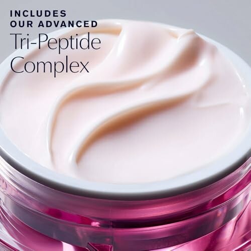 Open jar of cream with tri-peptide complex label.