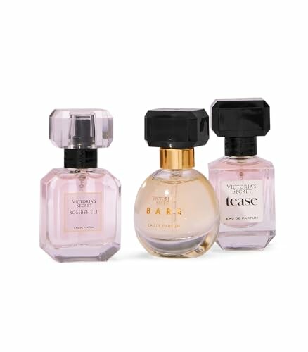 Three Victoria's Secret perfume bottles: Bombshell, Bare, and Tease.