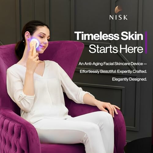 Woman using anti-aging facial skincare device on purple chair.